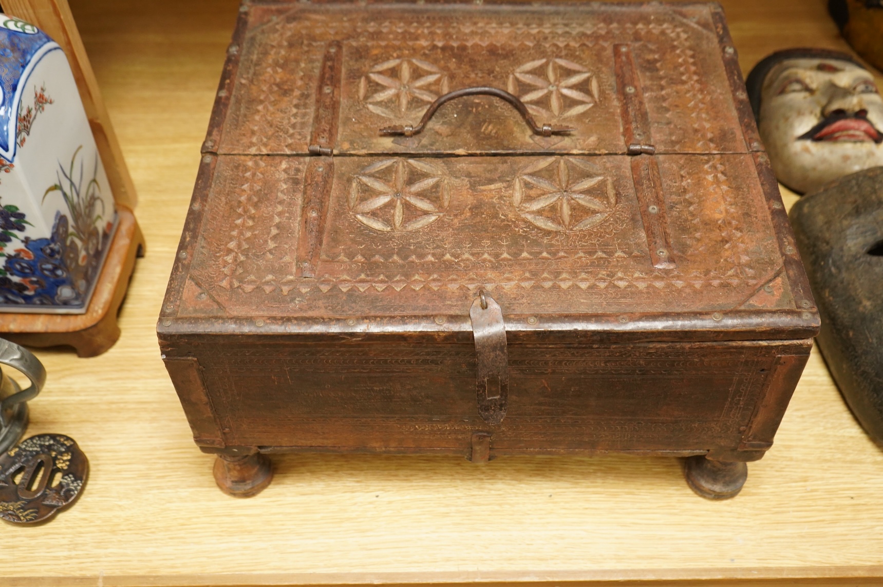 An Indian table top dowry chest with chip-carved and incised detail, 39cm wide